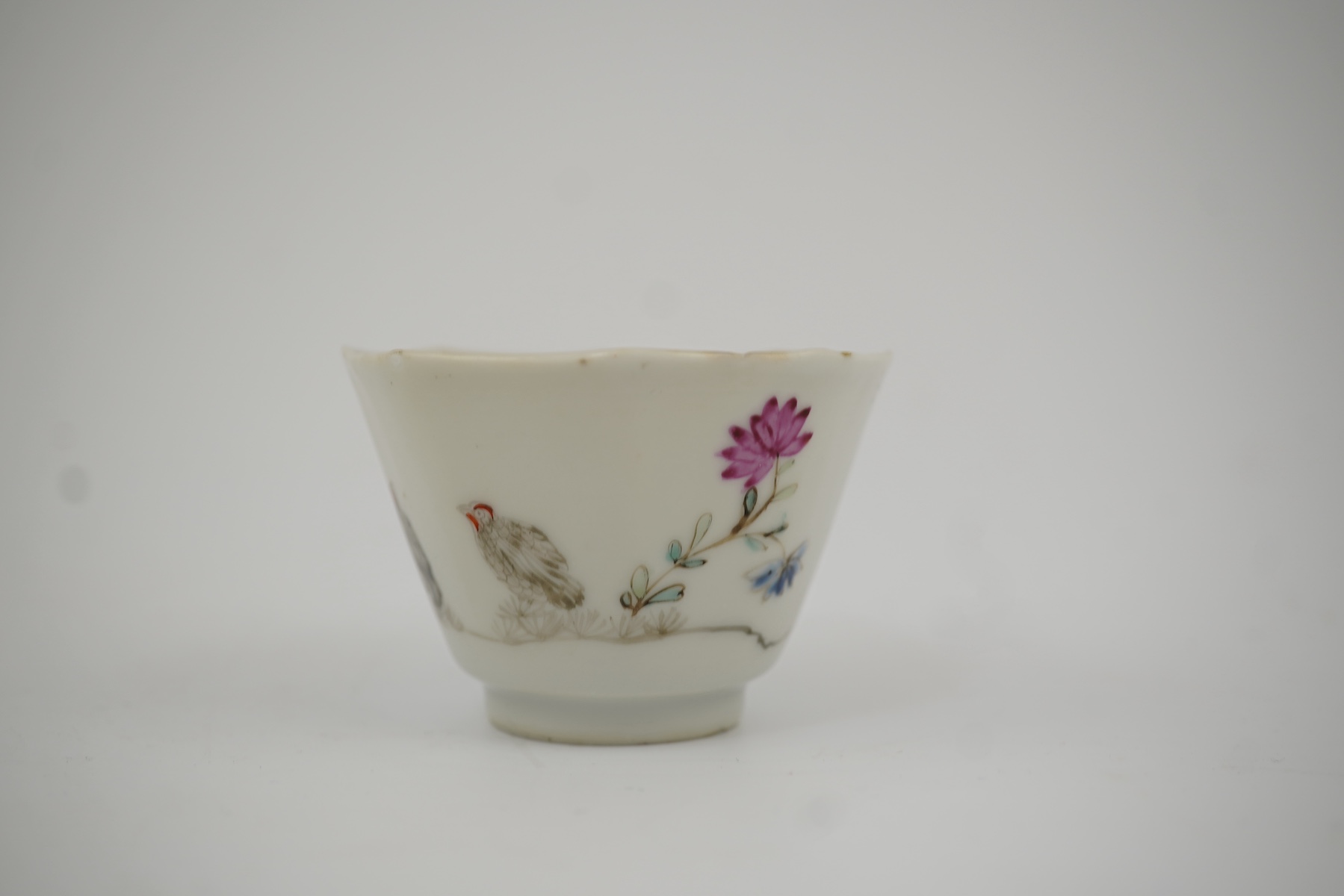 Two Chinese semi-eggshell porcelain hexagonal saucers and a similar cup, Yongzheng/Qianlong period